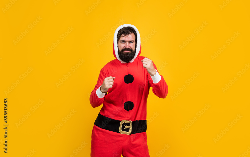 happy male hipster with beard and moustache wearing santa costume for xmas party celebration, holiday fun happy male hipster with beard and moustache wearing santa costume for xmas party celebration, holiday fun