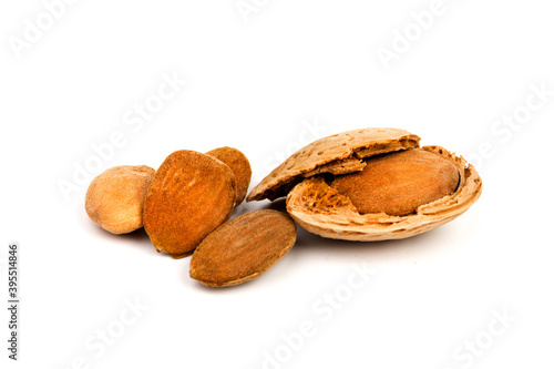 almond nuts in close-up, isolated on white background