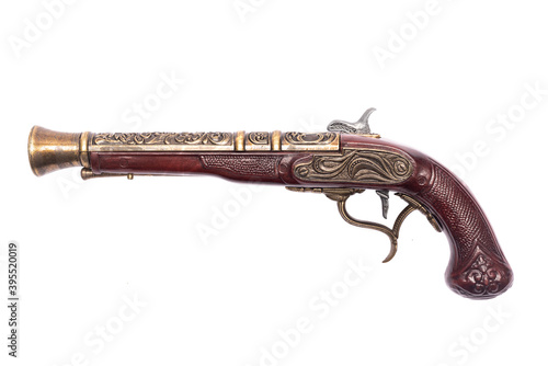 Ancient musket gun isolated on the white background.