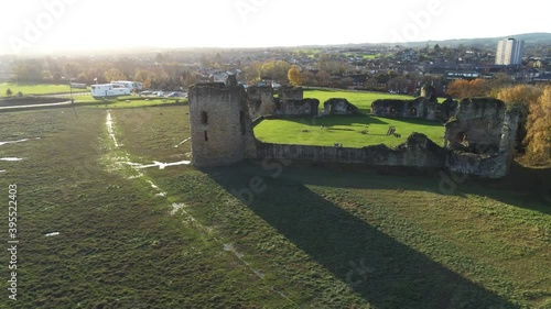 Historical Flint castle medieval military ruins landmark aerial view low orbit left photo