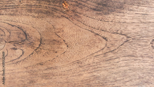 background Abstract texture Where nature creates A photograph of the wood with a serpentine pattern, brown and old.