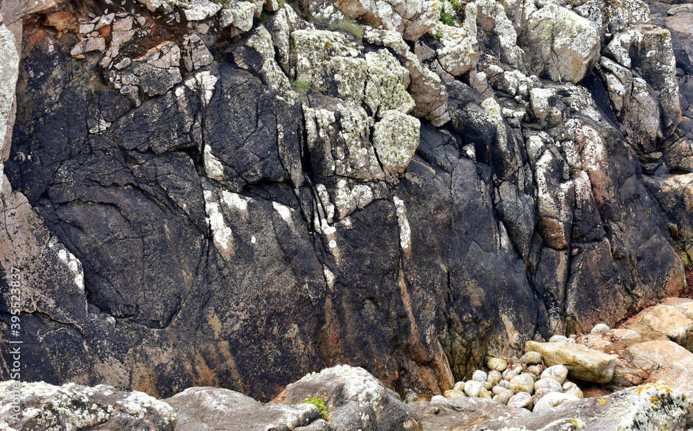 Rocks with oil spill from the sinking of oil tanker MV Prestige in 2002. Costa da Morte Region 18 years after, Camariñas, Coruña, Galicia, Spain.
