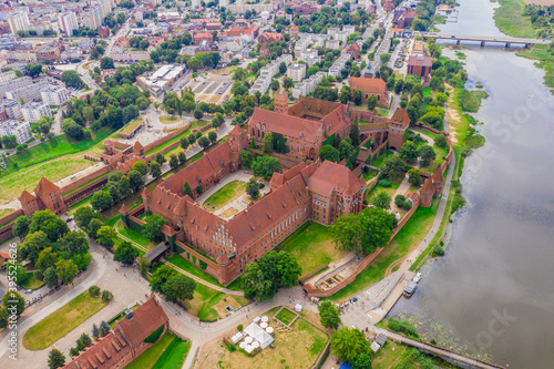 Aerial view of Malbork Teutonic order castle in Poland. It is the largest castle in the world measured by land area and a UNESCO World Heritage Site, built in 13th-century.