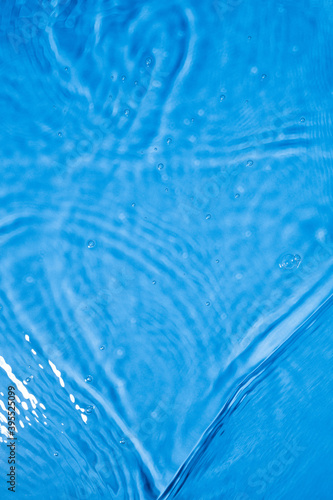 Blue water ripples and splashes. Blue water texture. 