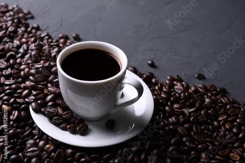 Coffee cup and beans on old grey kitchen beton , rock table. Top view with copyspace for your text