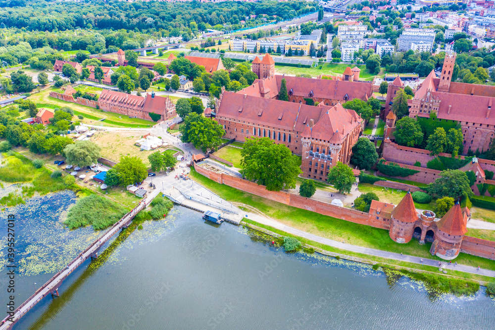 Aerial view of Malbork Teutonic order castle in Poland. It is the largest castle in the world measured by land area and a UNESCO World Heritage Site, built in 13th-century.