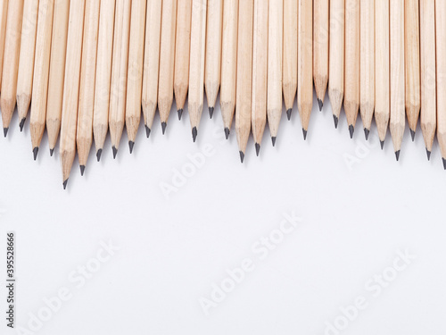 many simple pencils with a lead on a white background