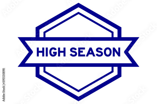 Hexagon vintage label banner in blue color with word high season on white background