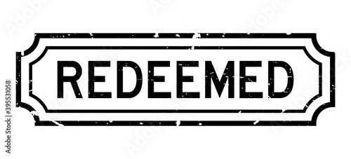 Grunge black redeemed word rubber seal stamp on white background