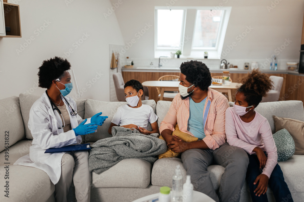 Healthcare worker at home visit during examination Healthcare worker at home visit during examination