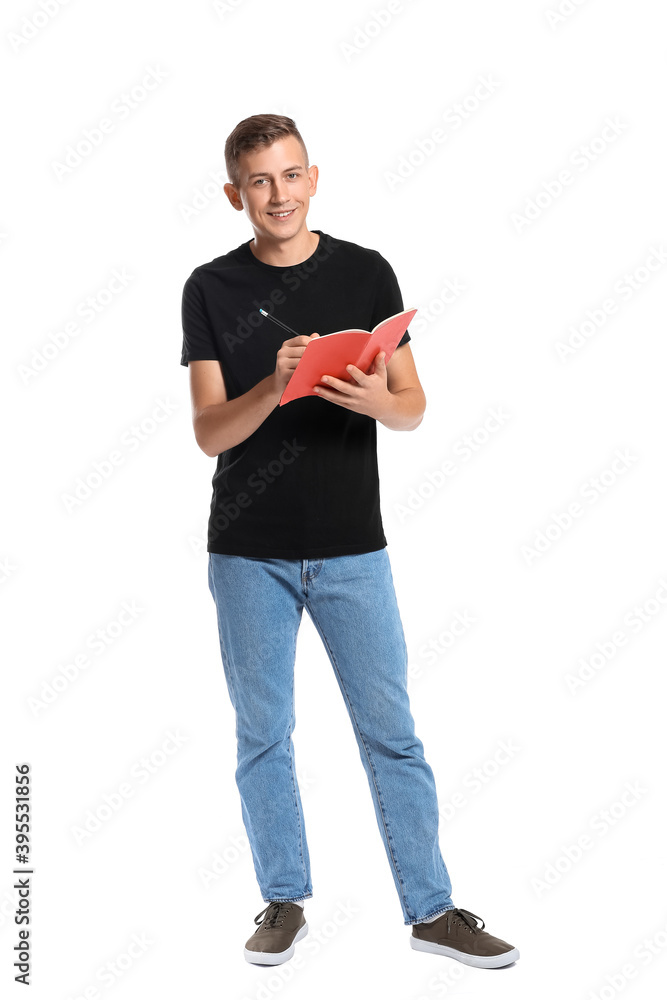 Young man with notebook on white background Young man with notebook on white background