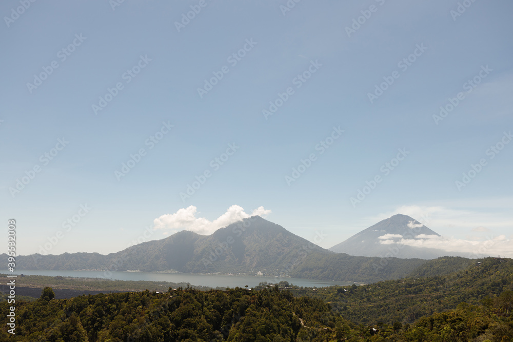 Fototapeta premium Beautiful mountain landscape of Bali island - volcano Batur in Kintamani and lake. Travel Indonesia concept
