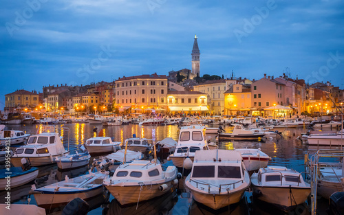 view of Rovinj in Croatia with boats at the port