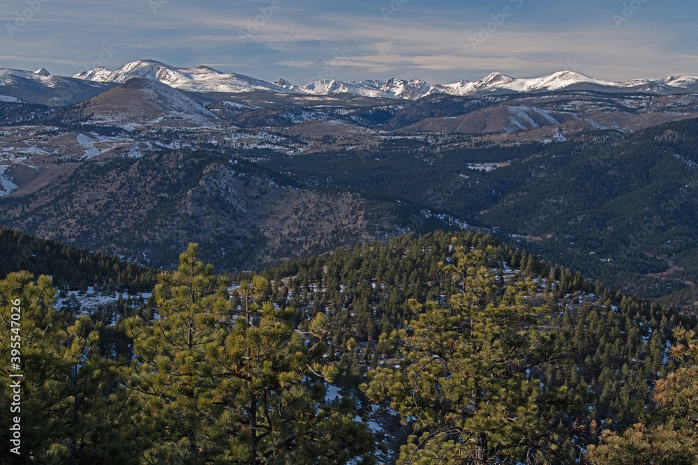 Winter landscape at sunrise of the Front Range of the Rocky Mountains from Lost Gulch Overlook, Flagstaff Mountain, Boulder, Colorado, USA