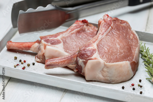 Raw Duroc pork chops photo