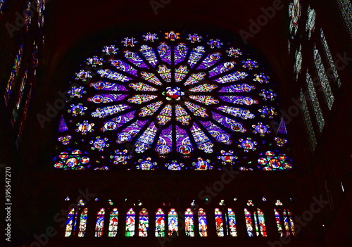 Rose window and stained glass windows at Basilique Royale de Saint-Denis. Paris, France.