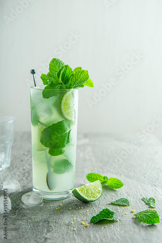 Mojito cocktail with lime, brown sugar and mint