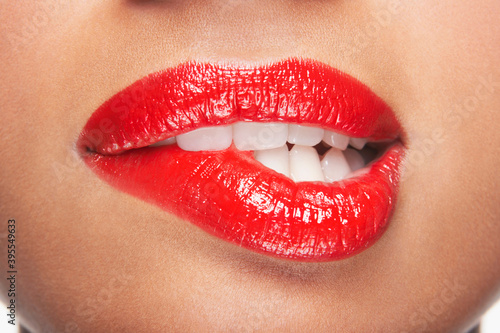 Woman Biting Red Lips