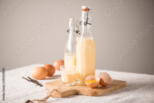 Eggnog in bottles and a glass