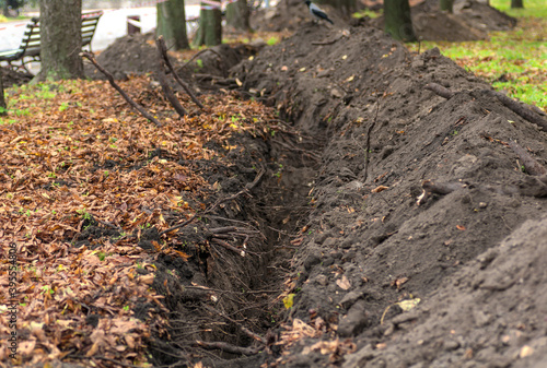 construction of the trench ditch in the Park in autumn