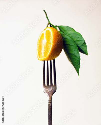 Orange on a fork photo