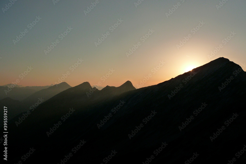 Sunset at mountain crossing Ammergau Alps