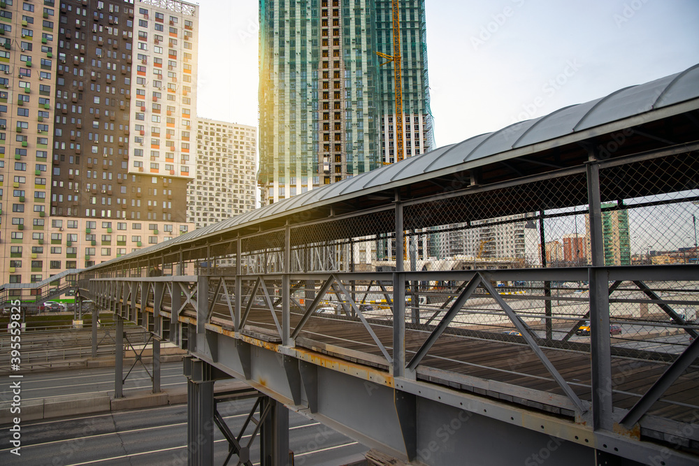 Pedestrian bridge over the motorway in the city