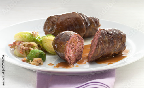 Venison roulade with brussels sprouts photo