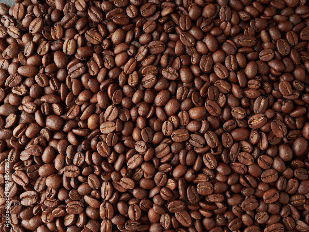 top view of fresh roasted coffee beans background top view of fresh roasted coffee beans background
