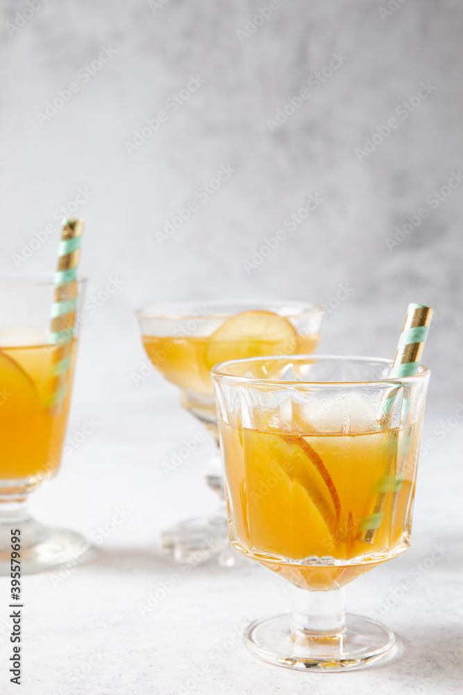 Earl Grey tea with apple slices and ice cubes Earl Grey tea with apple slices and ice cubes