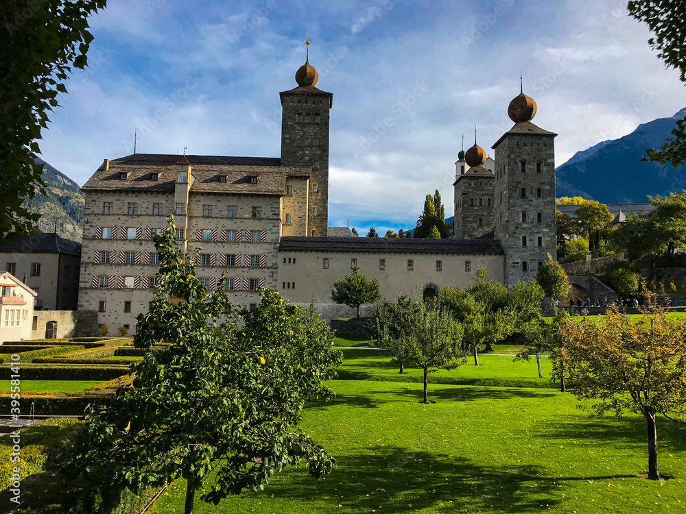 Sunny day with blue sky in the mountains of Switzerland with magnificent views of the  Alps and castle Stockalper. 