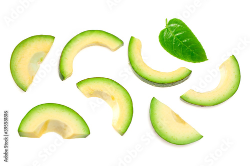 fresh avocado with slices isolated on white background. top view.