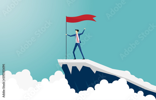 Businessman climb to the top of the mountain
