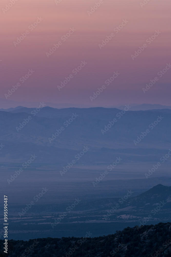 Pink Sky over layers of desert valley
