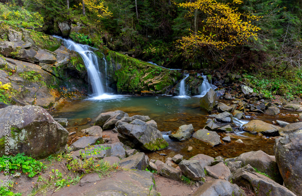 Carpathians. Skole. Waterfall on a mountain river.