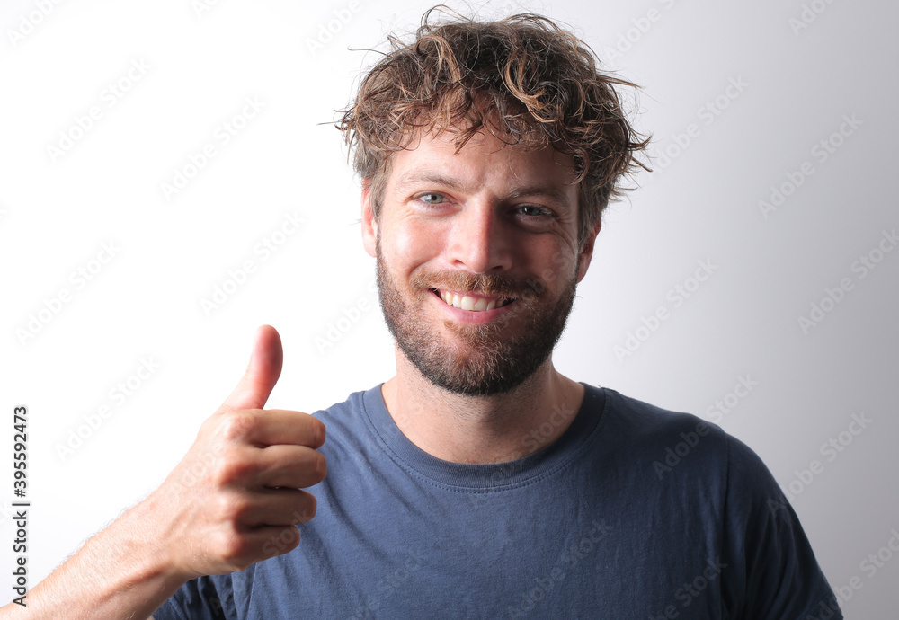 portrait of man with raised thumb portrait of man with raised thumb