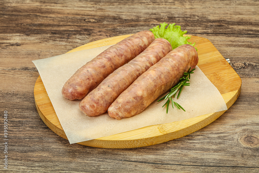 Raw pork meat sausages for grill Raw pork meat sausages for grill