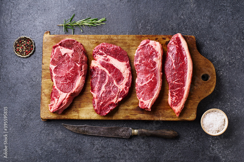 Variety of fresh Black Angus Prime raw beef steaks photo