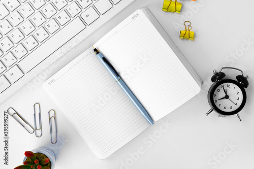 Wallpaper Mural Top view of laptop and notepad on table Torontodigital.ca