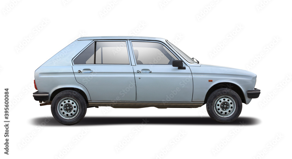 Classic French hatchback car side view isolated on white background