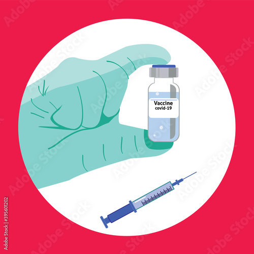Hand with medical gloves holding vaccine bottle.