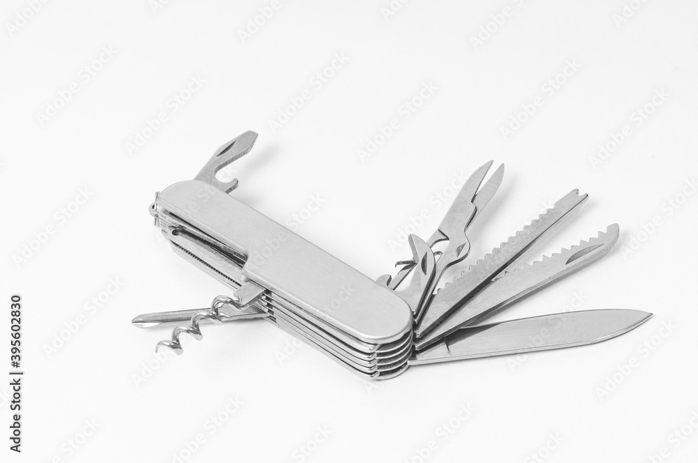 multi-function knife on white background close-up, mock-up, blank for your design multi-function knife on white background close-up, mock-up, blank for your design