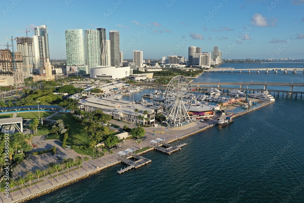 Miami, Florida - November 26, 2020 - Aerial view of Bayside Marketplace, City of Miami Marina and Miami skyline on sunny autumn morning.