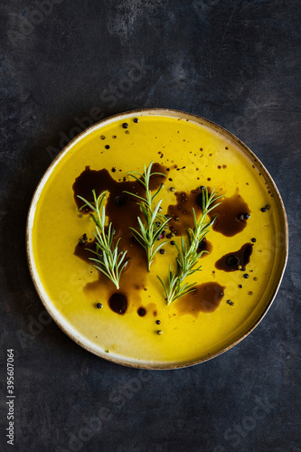 Olive oil and balsamic vinegar dip or dressing with pink salt and rosemary