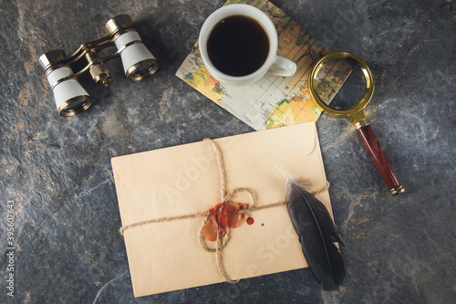 letter and coffee on table