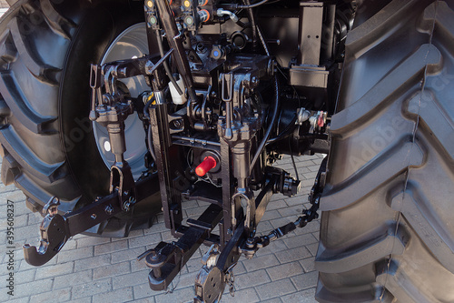 Devices for fastening mounted and trailed tractor equipment. Rear view close up.