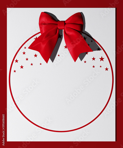 Red bow on paper, holidays card