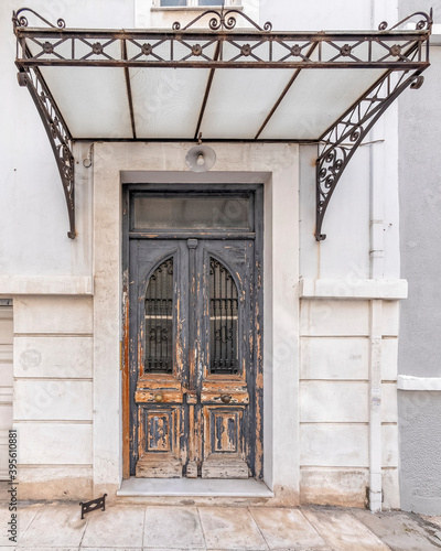 vintage house entrance weathered wood door, Athens Greece