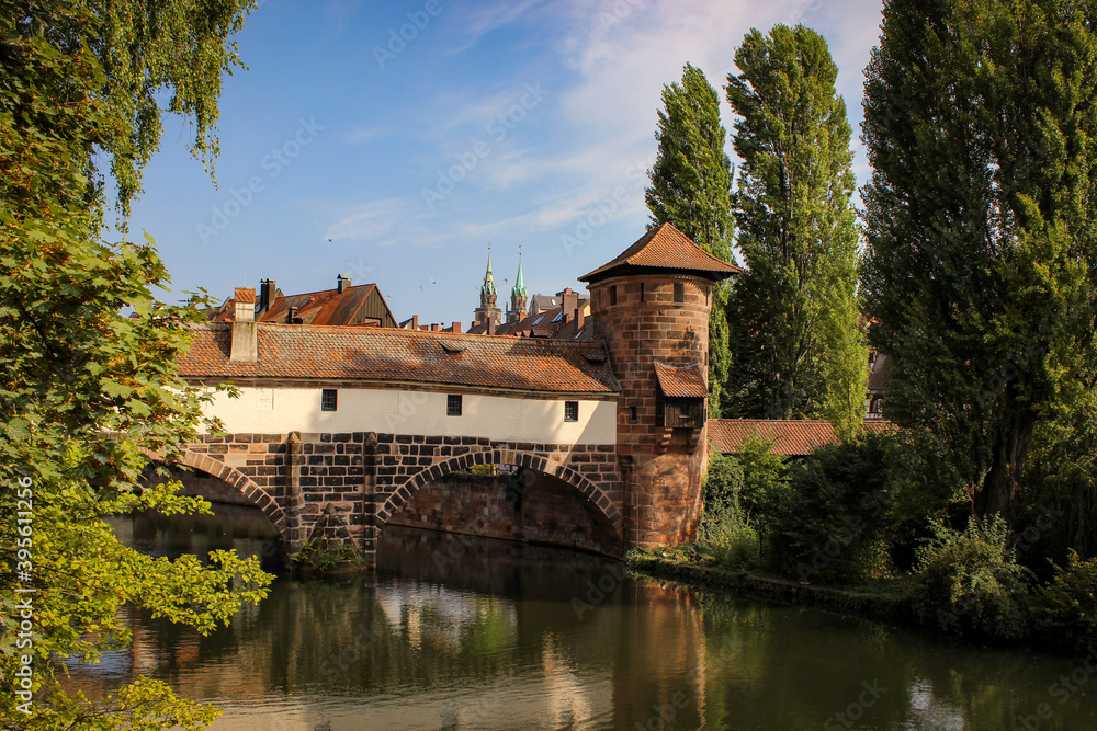Fototapeta premium Beautiful old houses and bridges over the canals in Nuremberg, Bavaria, Germany