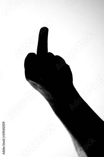 Silhouette of middle finger